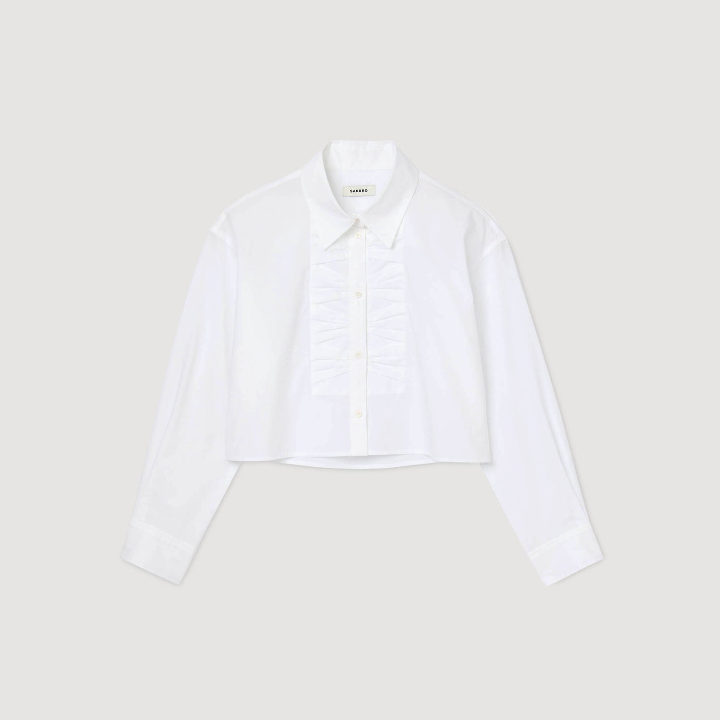 Camisa corta con detalles de lazos