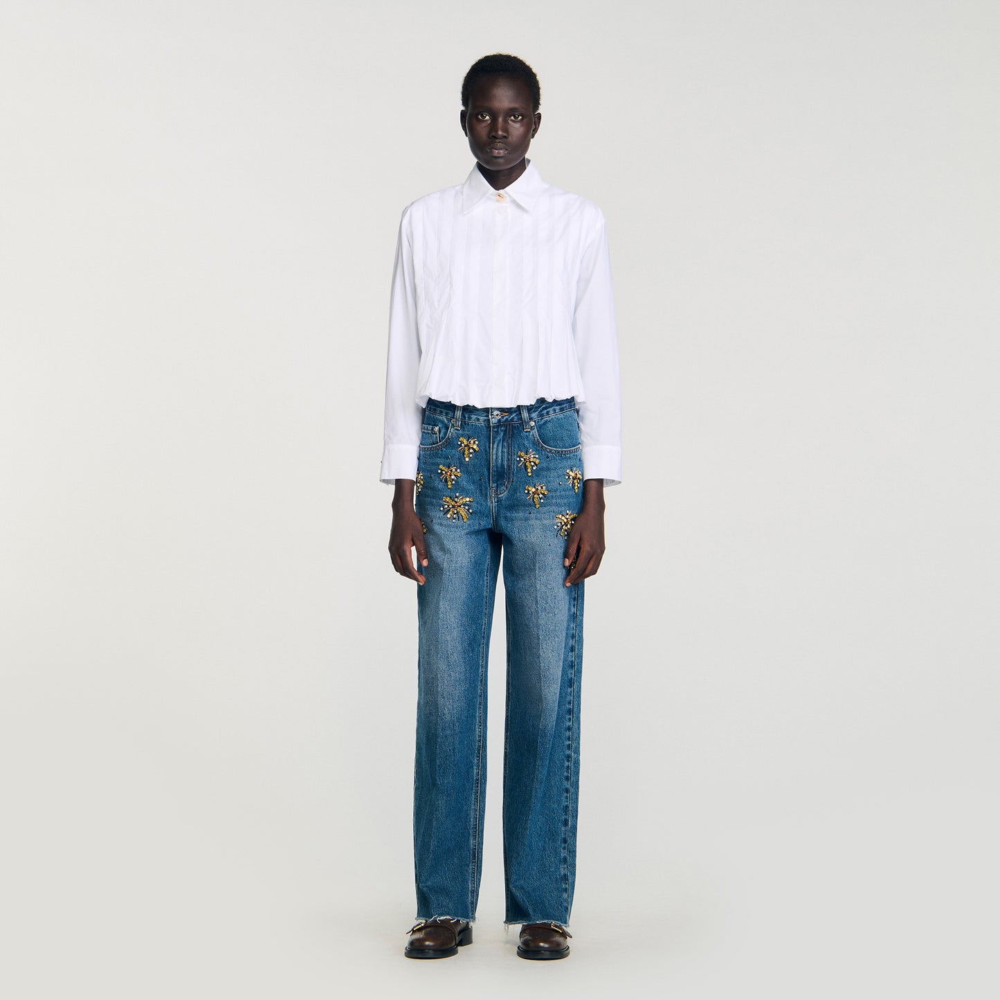 Camisa corta con pliegues