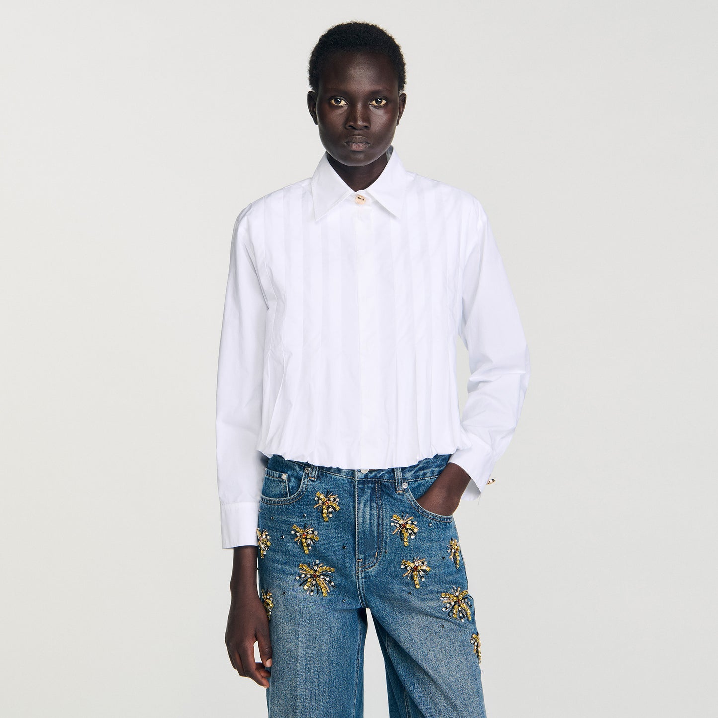 Camisa corta con pliegues