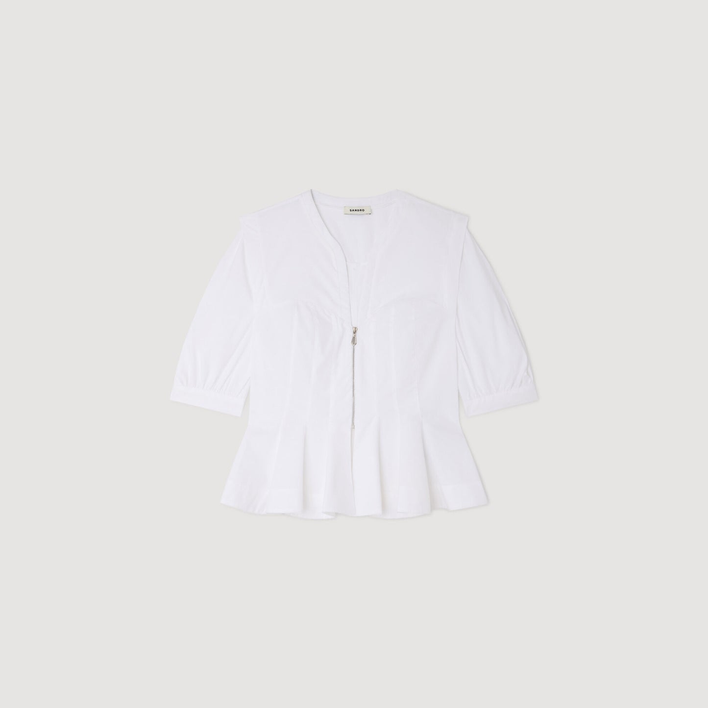 Camisa con cremallera y peplo