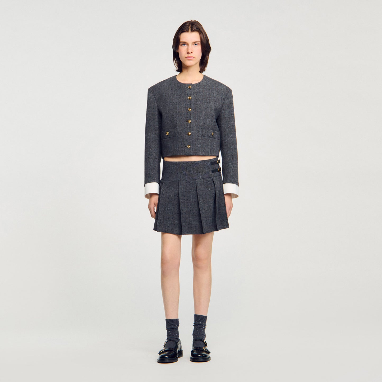 Falda corta de traje con strass