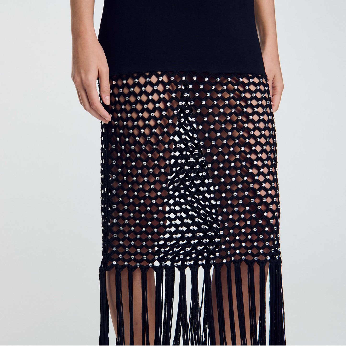 Vestido de punto con flecos