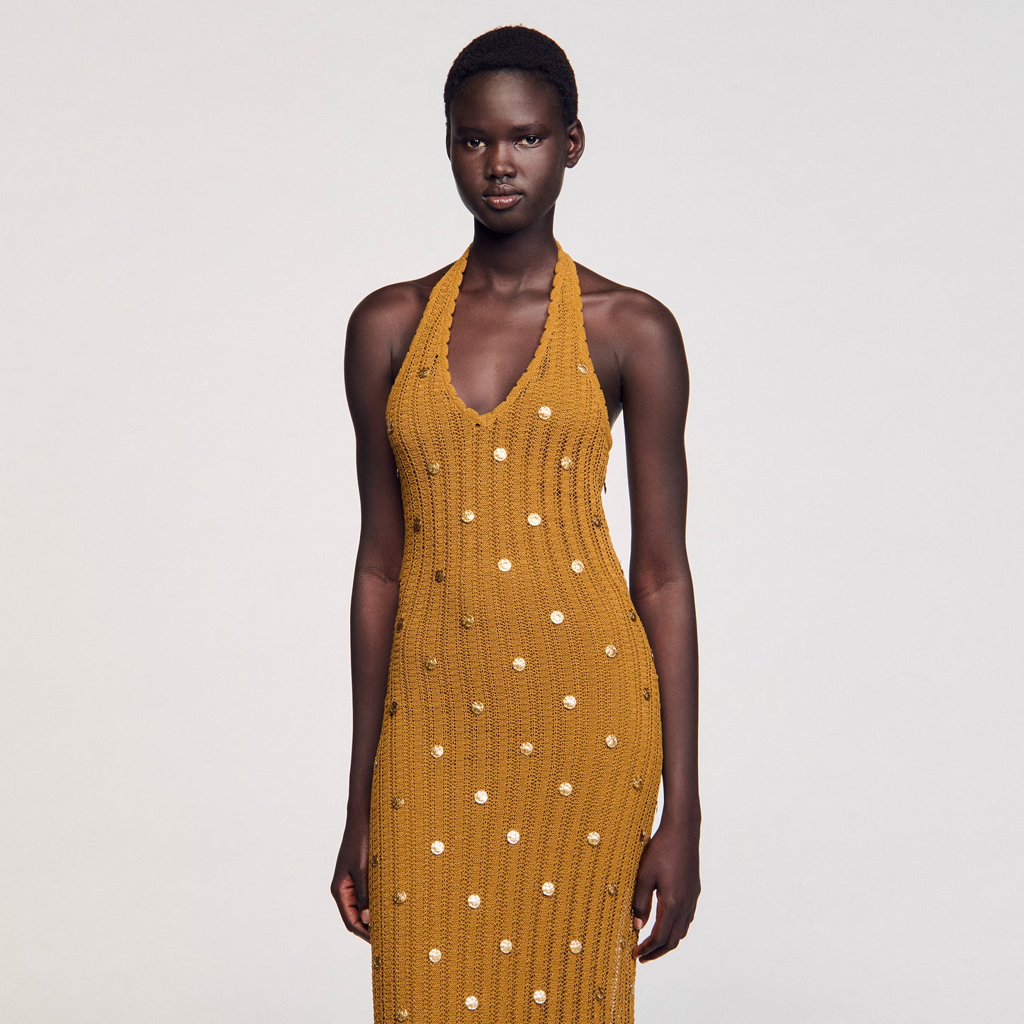 Vestido largo de punto con flecos