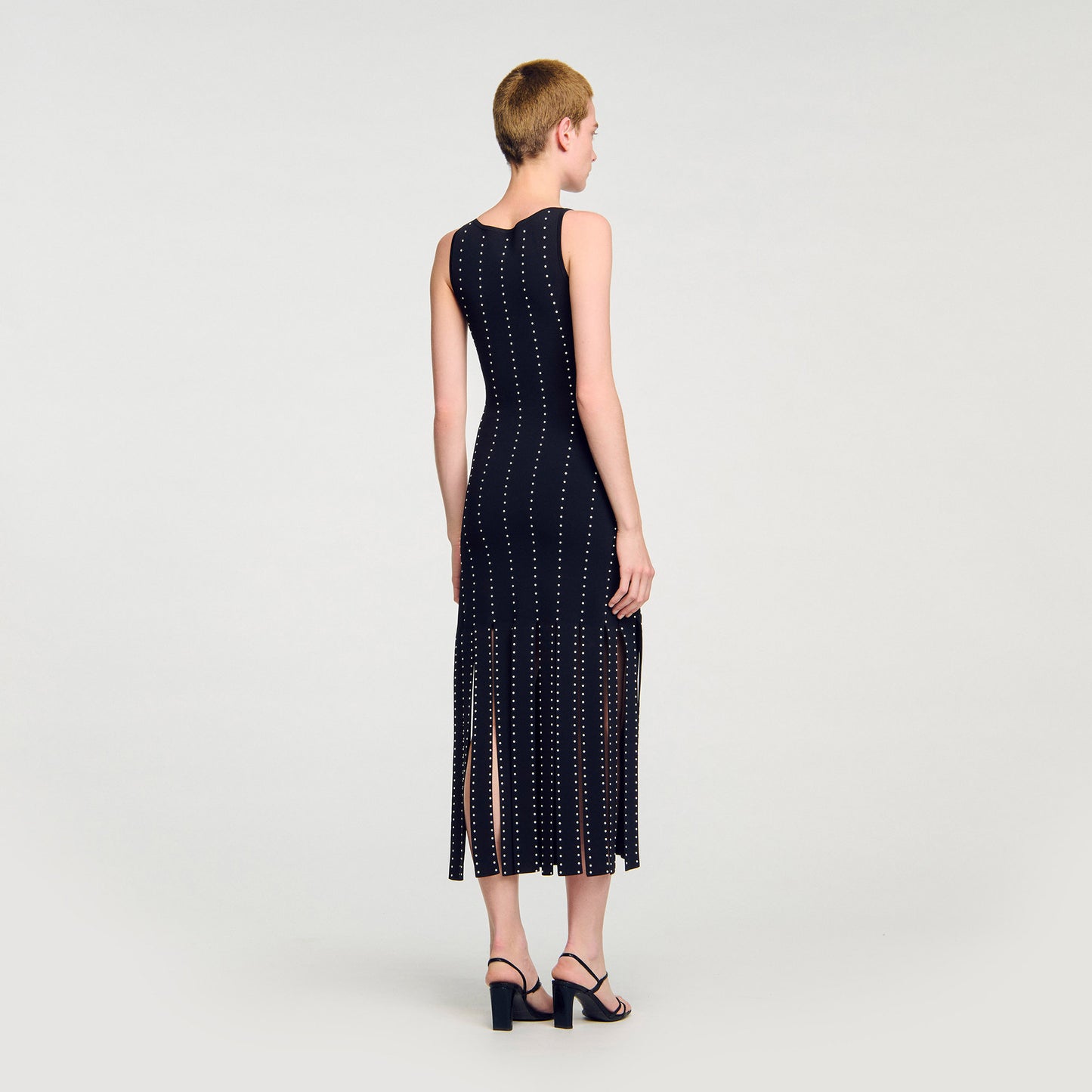 Vestido largo de punto con flecos