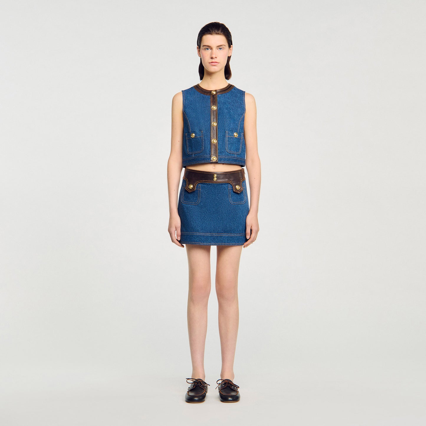Top de denim y cuero