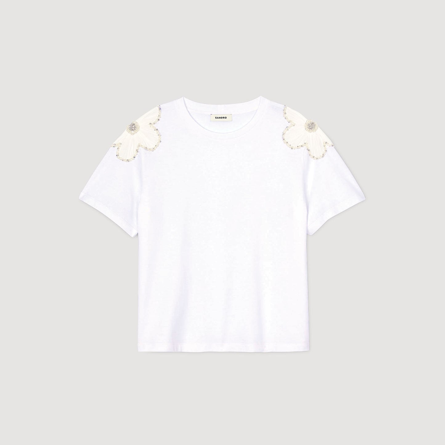 Camiseta con flores bordadas