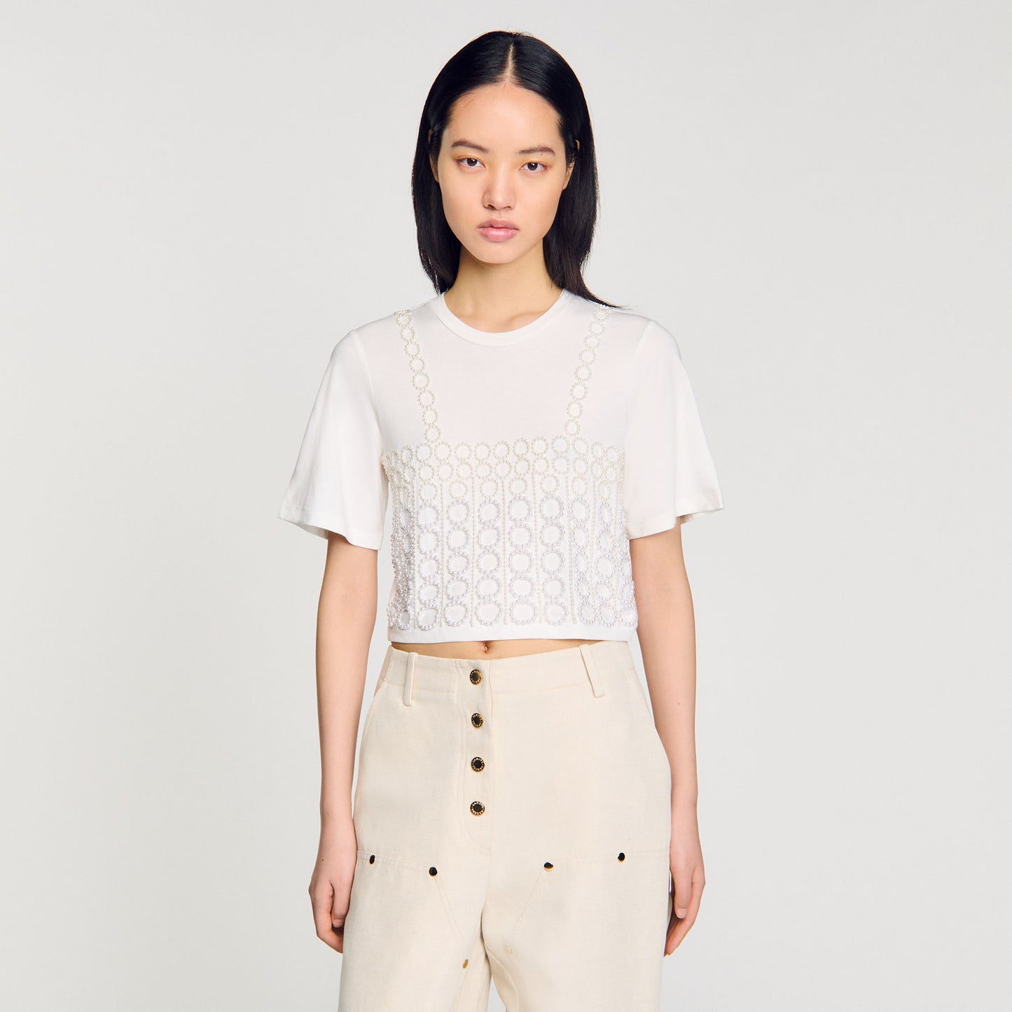 Camiseta cropped con pedrería