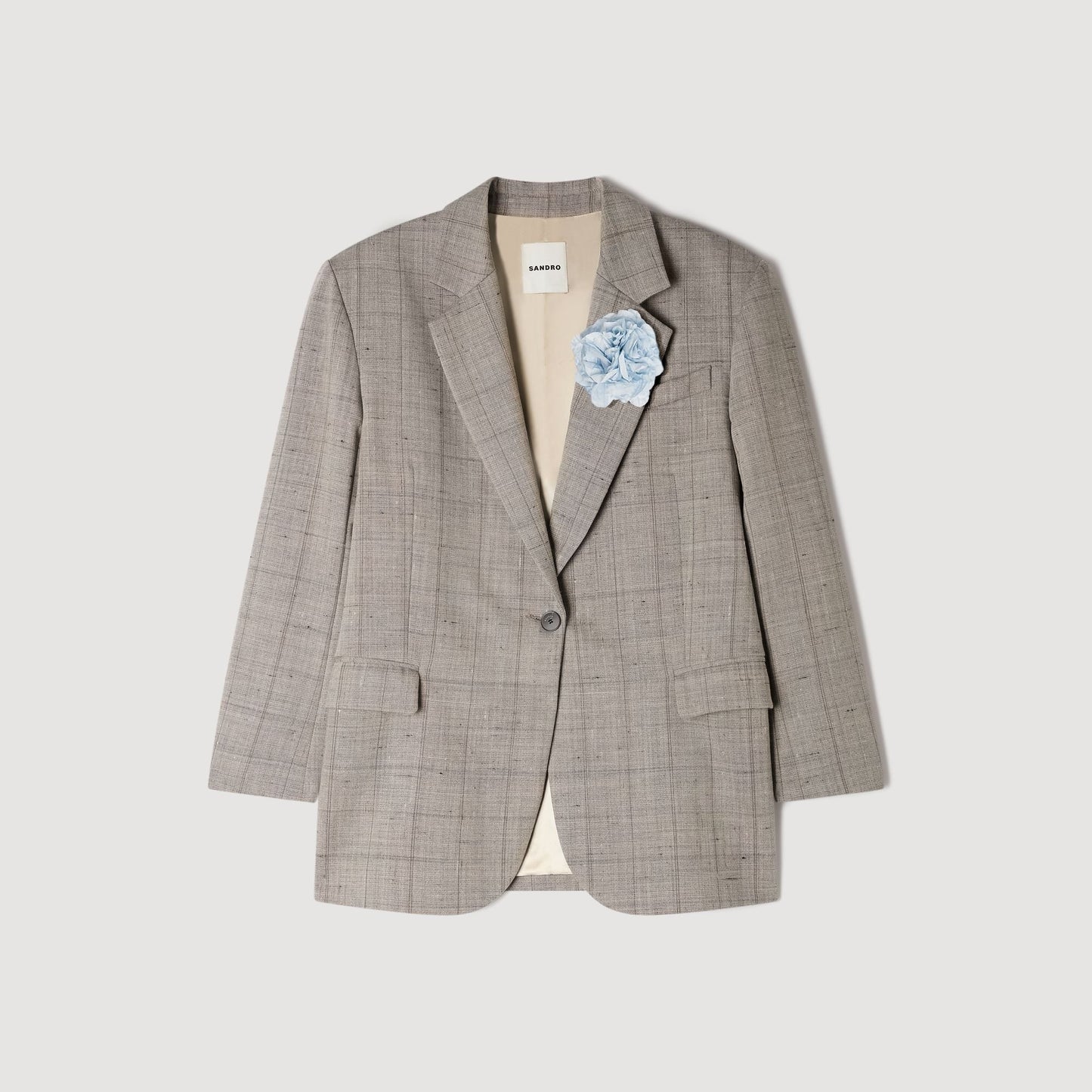Chaqueta de lana a cuadros y broche