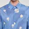 Camisa con estampado de flor