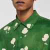 Camisa con estampado de flor