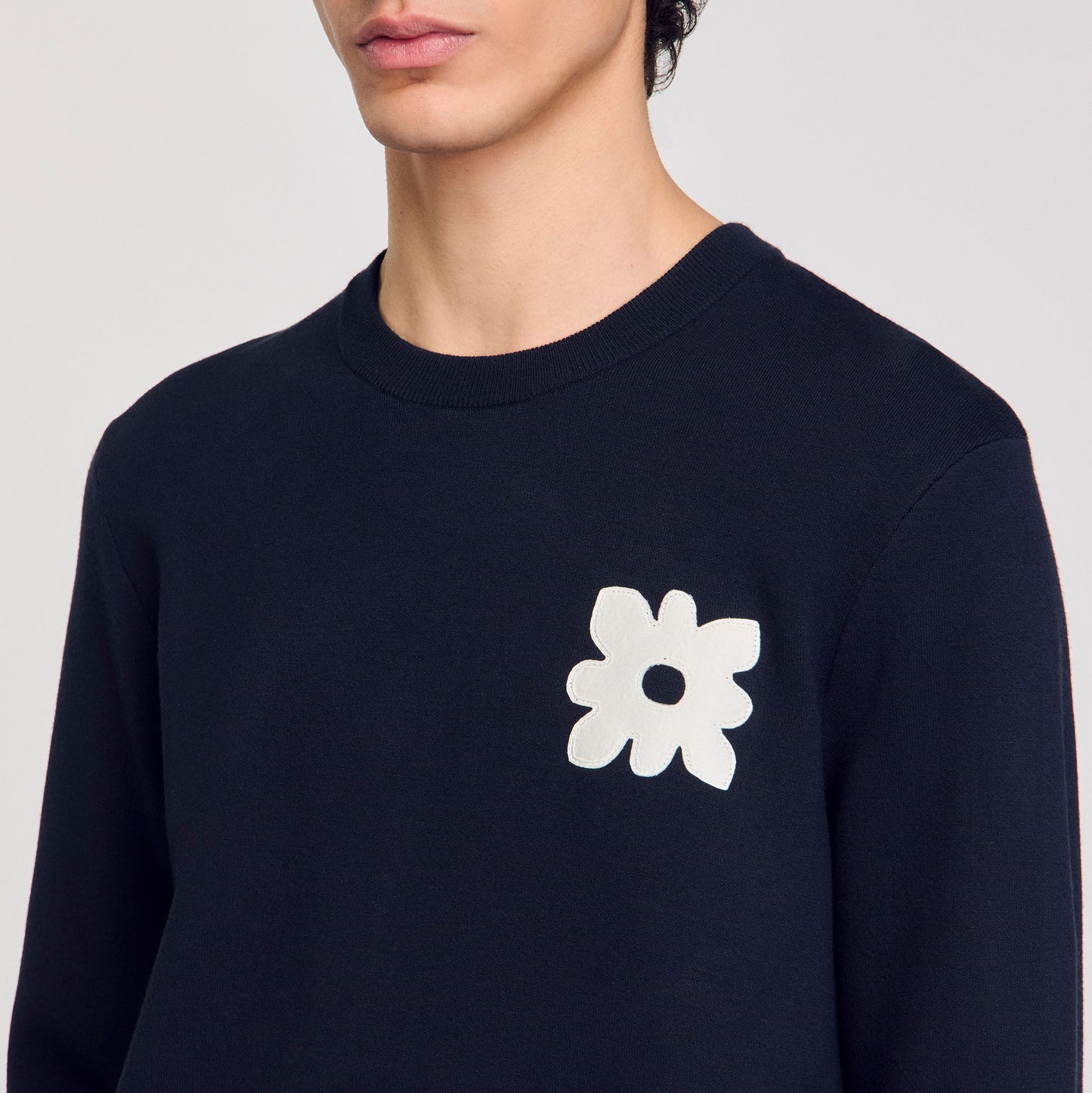 Jersey con detalle de flores