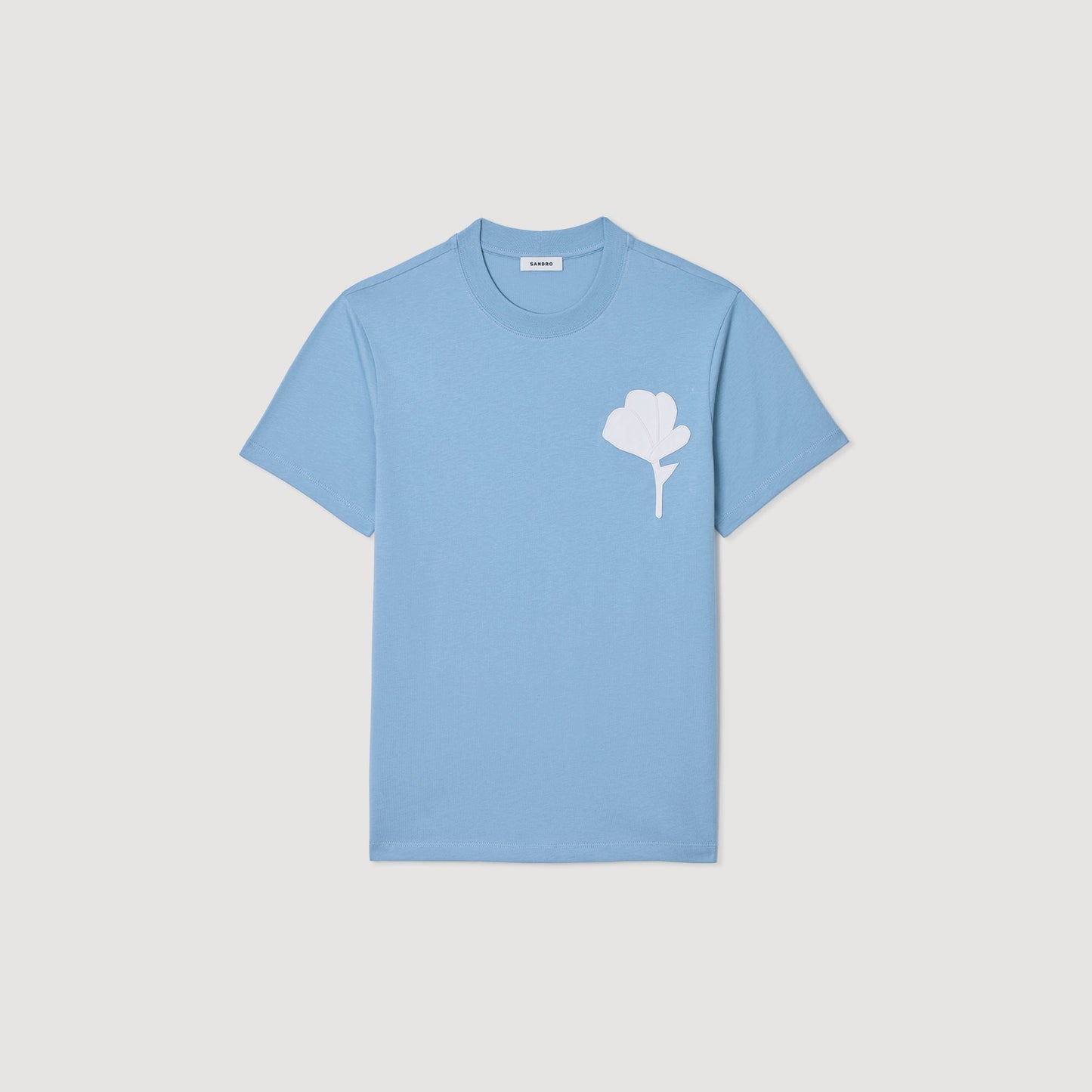 Camiseta con parche de flor