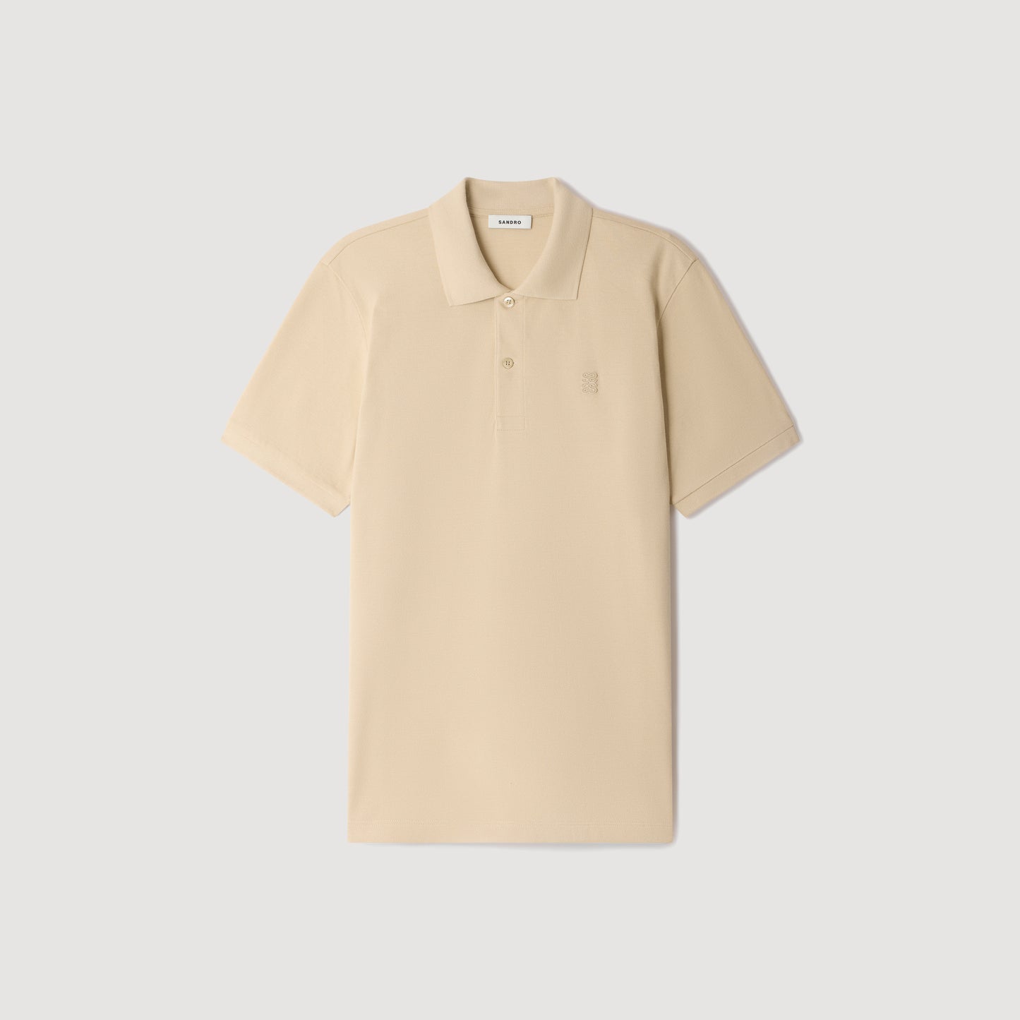 Polo de algodón con logo de cuero