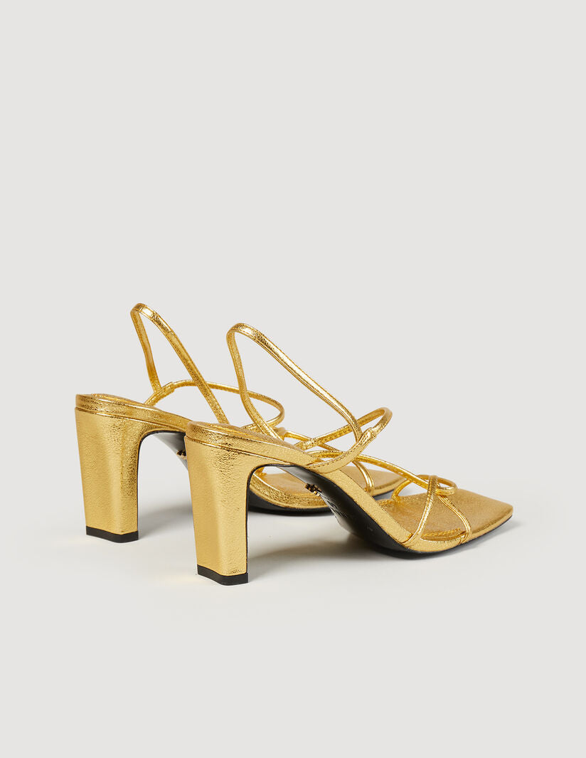 Sandalias de piel repujada