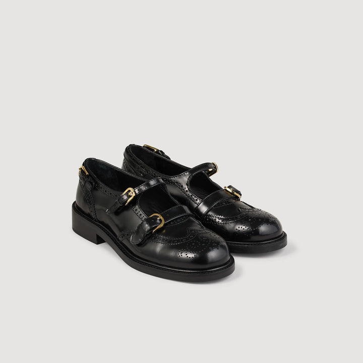Zapatos derby abiertos con hebillas