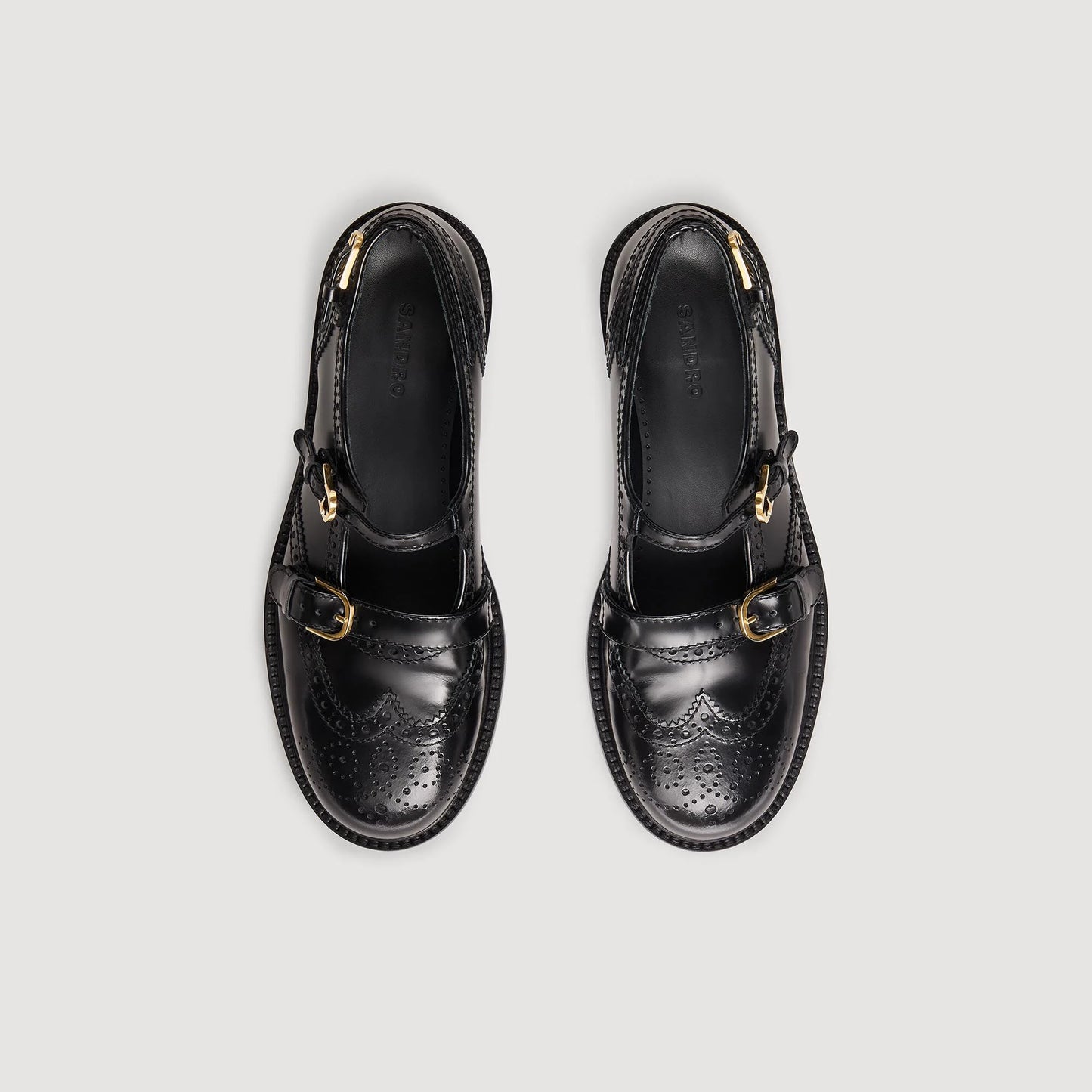 Zapatos derby abiertos con hebillas