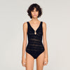 Body de punto con detalle joya
