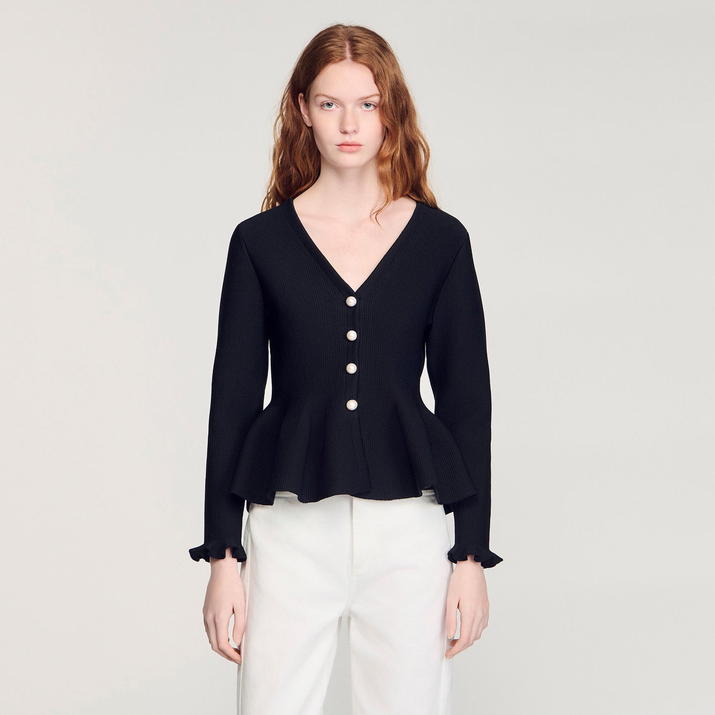 Cárdigan con peplum