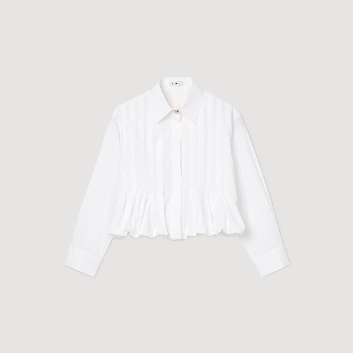 Camisa corta con pliegues