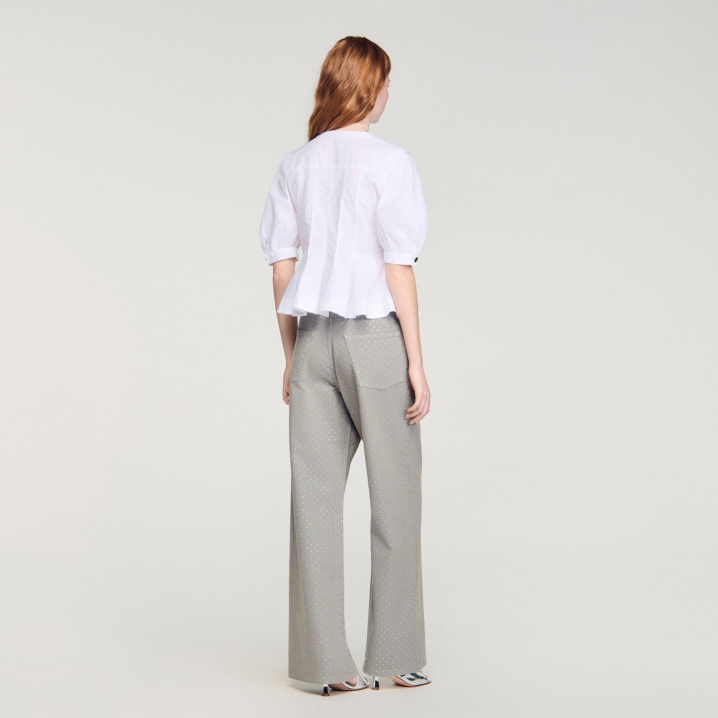 Camisa con cremallera y peplo