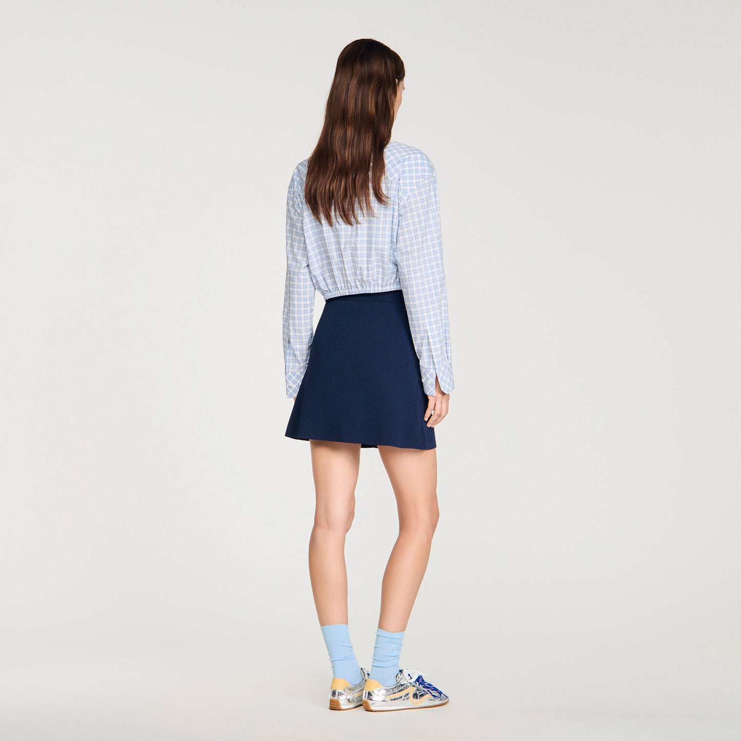 Falda corta de canalé con presiones