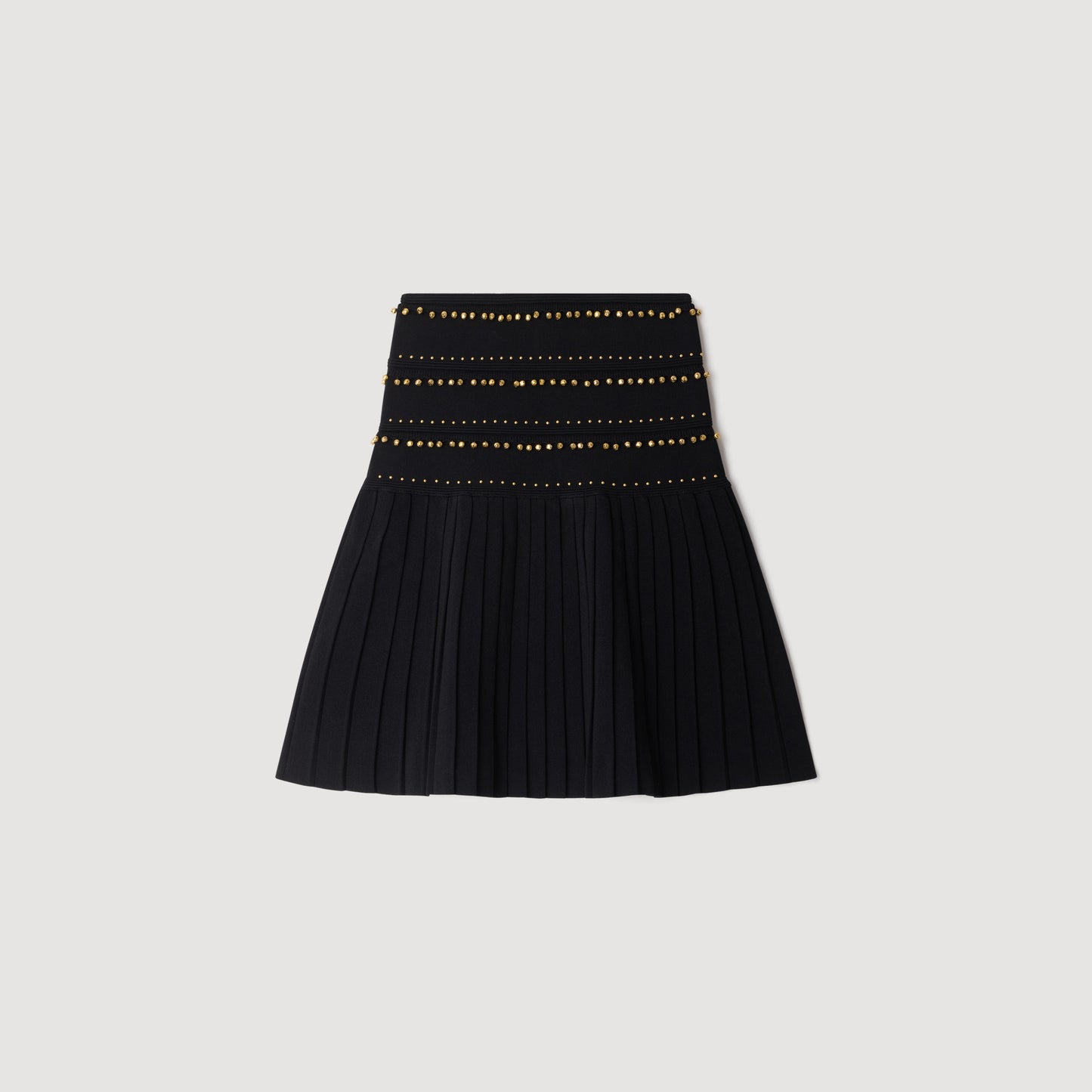 Falda corta con borlas