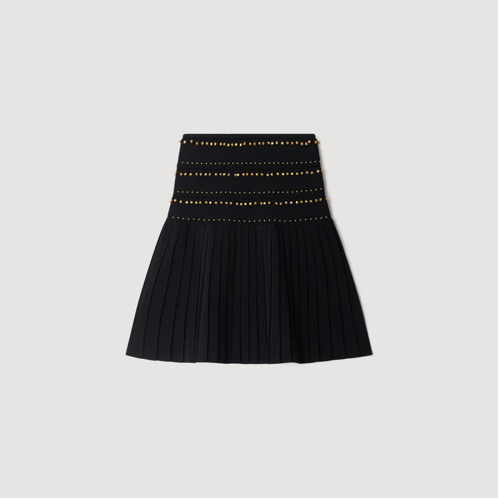 Falda corta con borlas