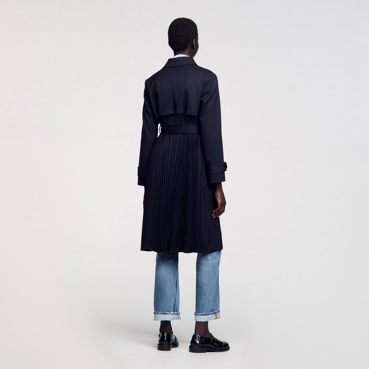 Gabardina con inserto plisado
