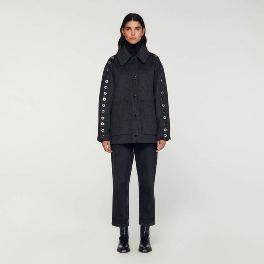 Abrigo oversize con ojales