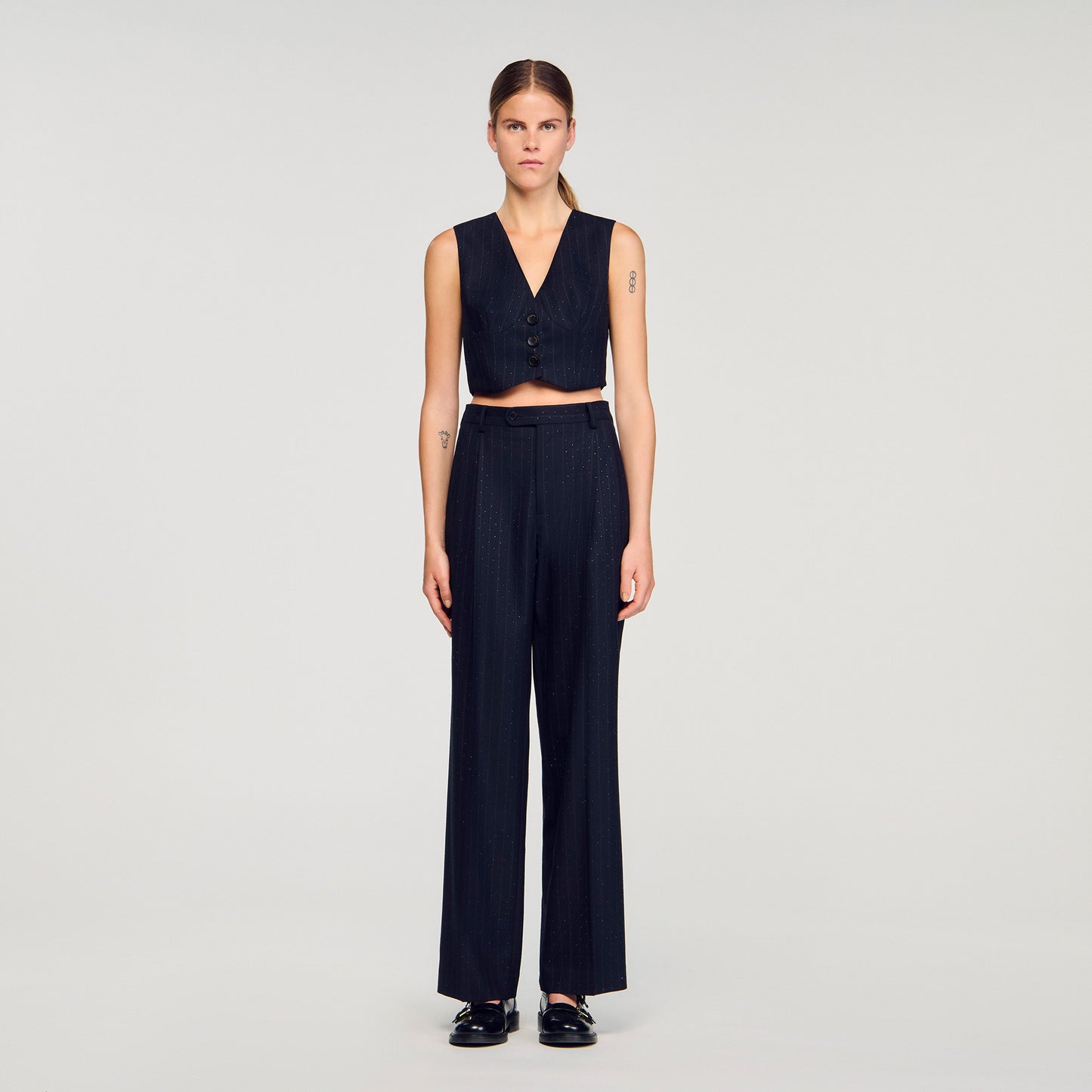 Pantalón a rayas con strass