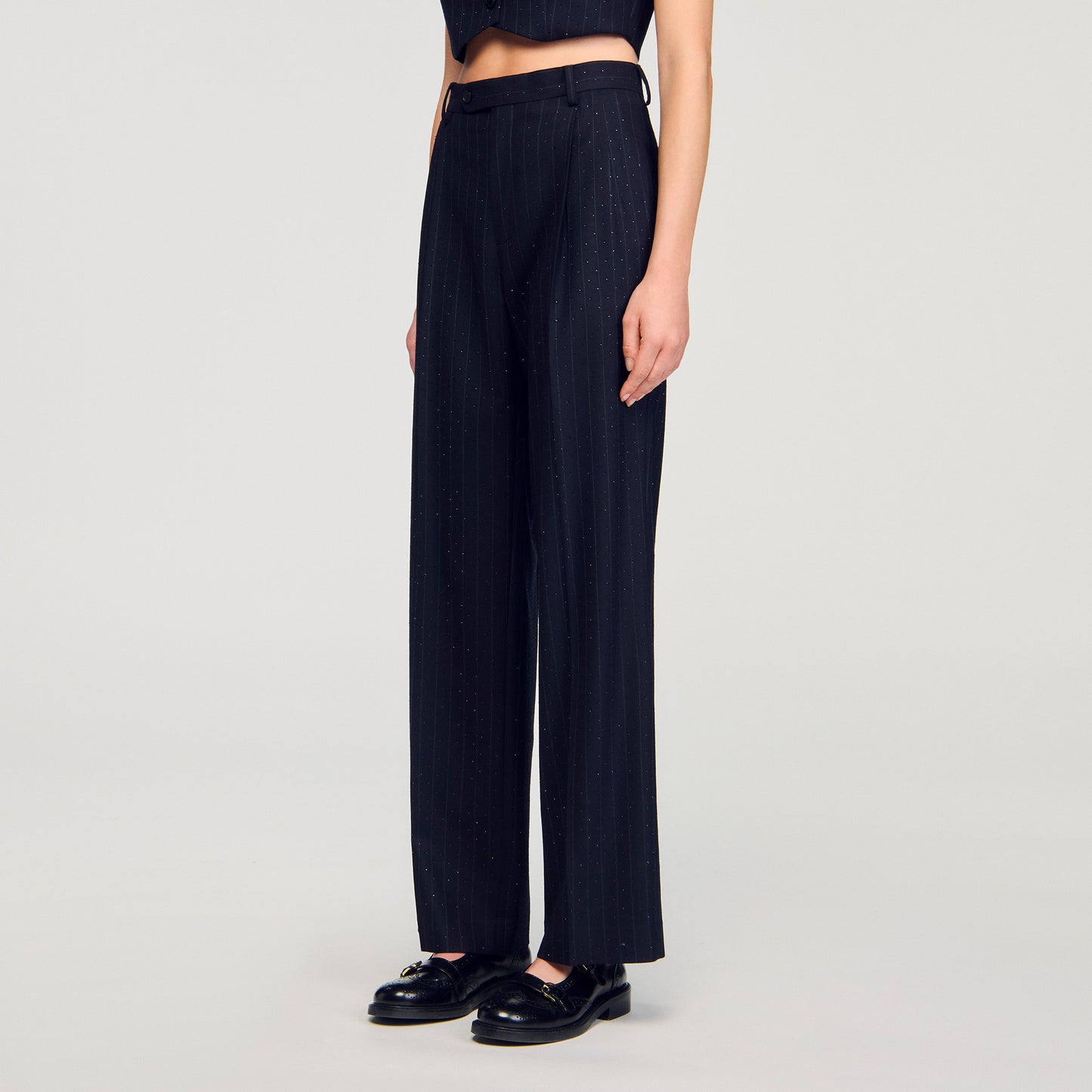 Pantalón a rayas con strass