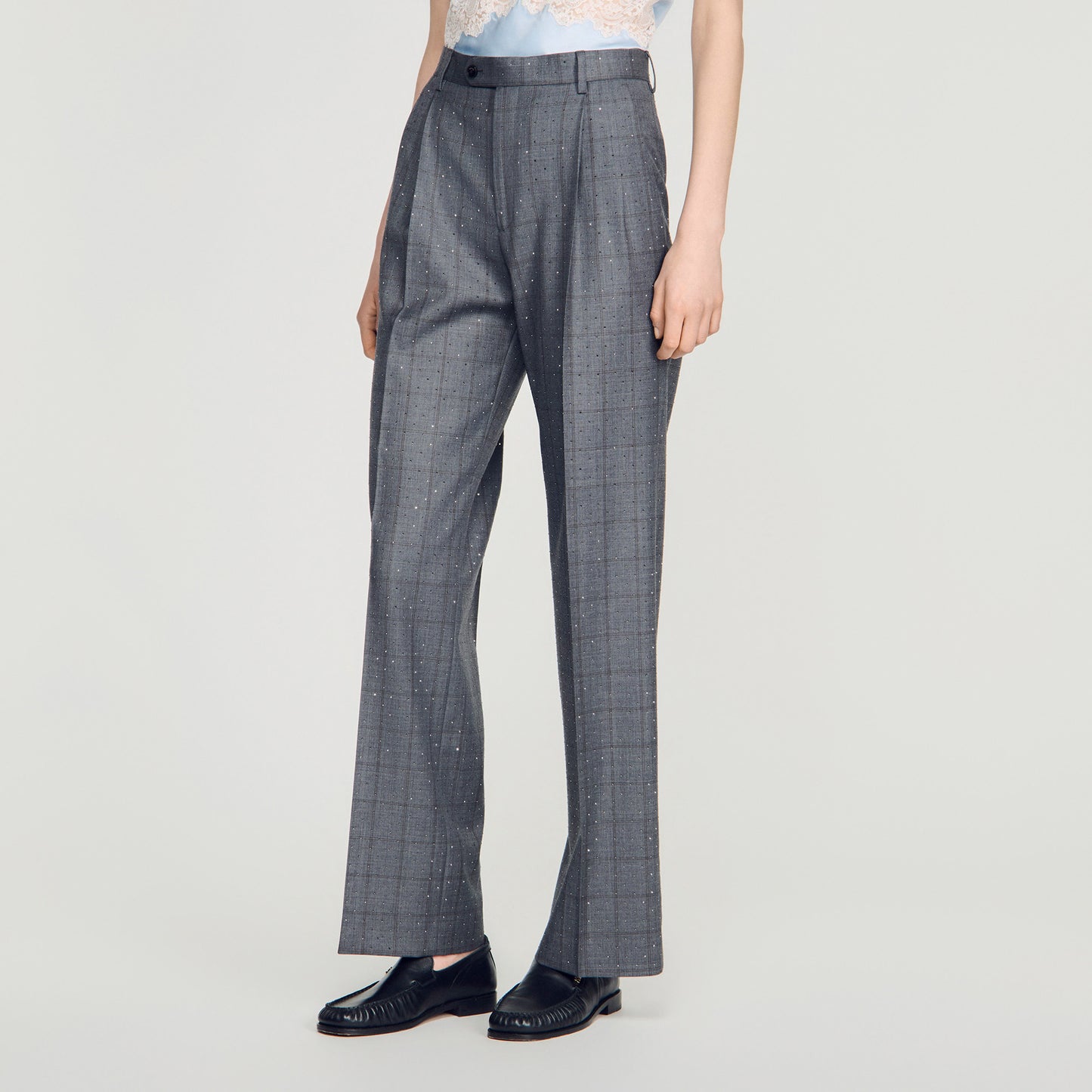Pantalón a cuadros con strass