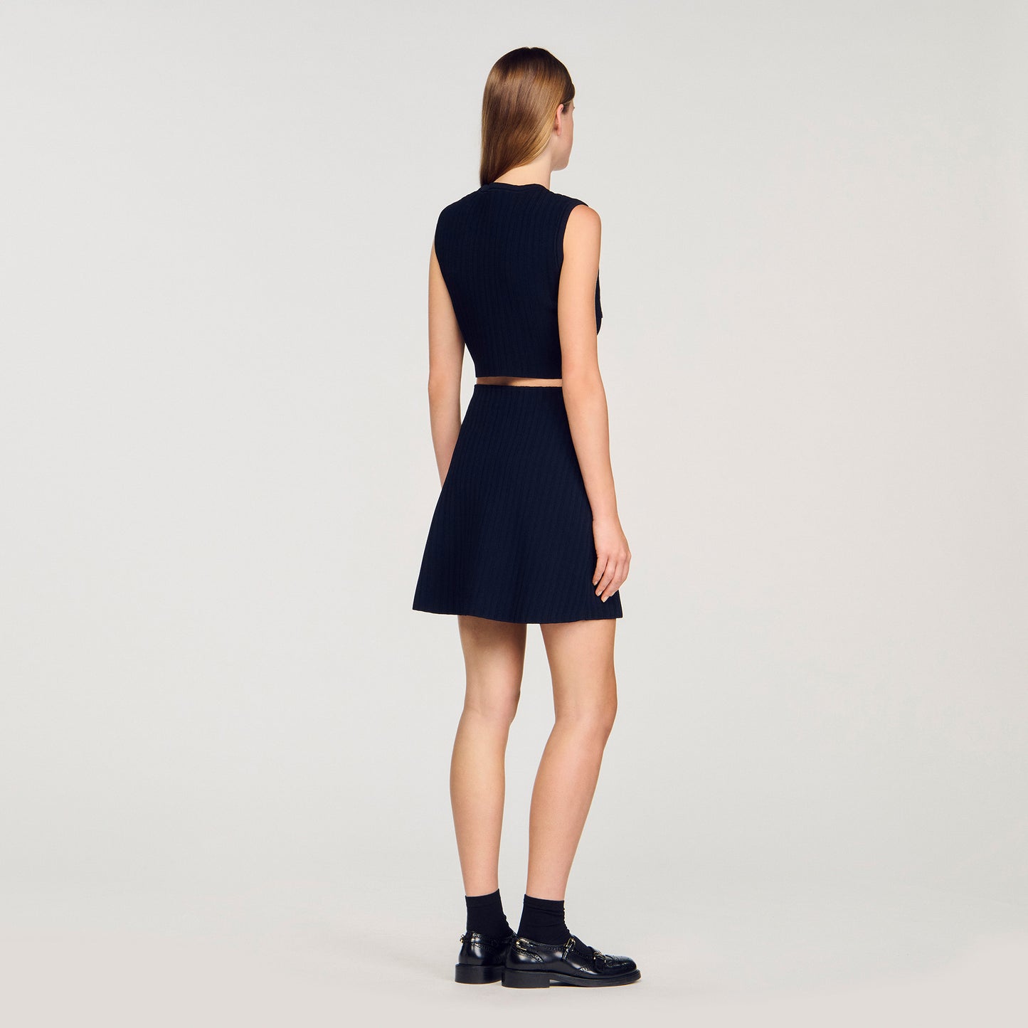 Top de punto y denim