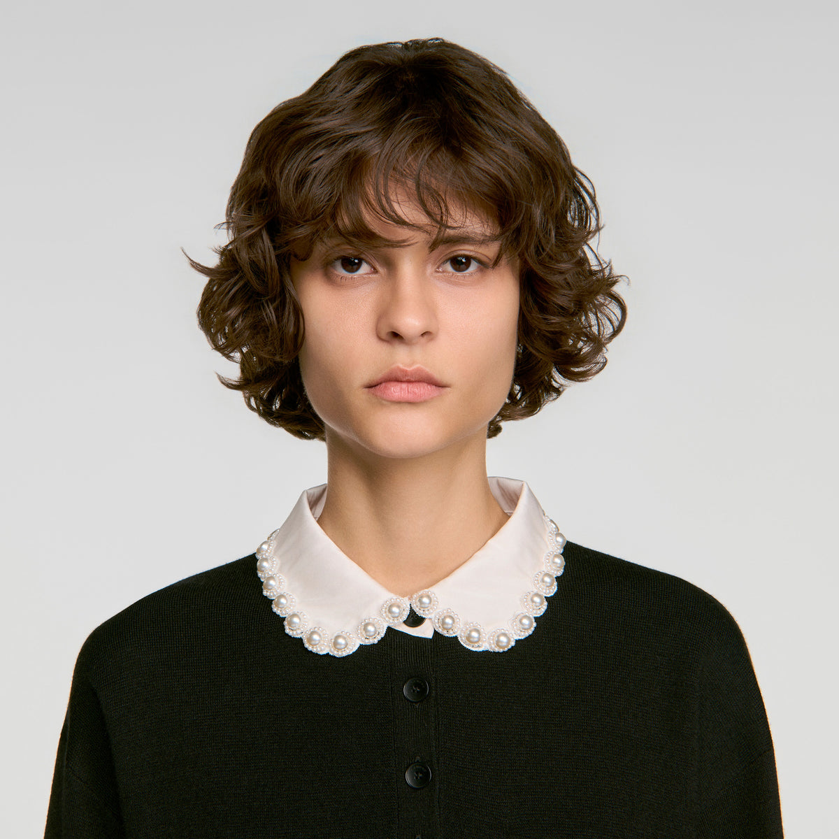 Jersey de cuello polo con perlas