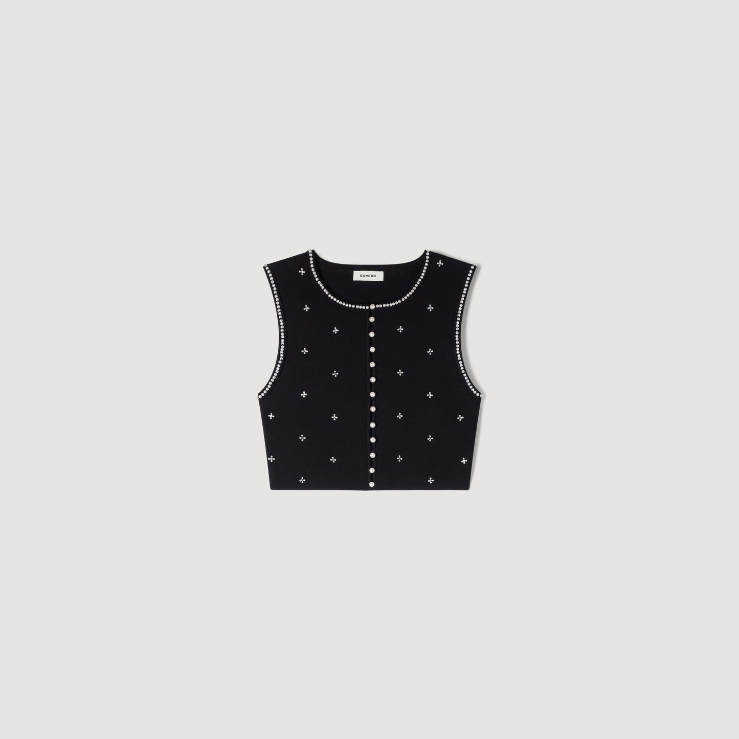 Top corto de punto bordado y strass