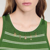Top a rayas con borlas