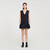 Vestido corto de sastre con volante