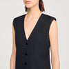 Vestido corto de sastre con volante
