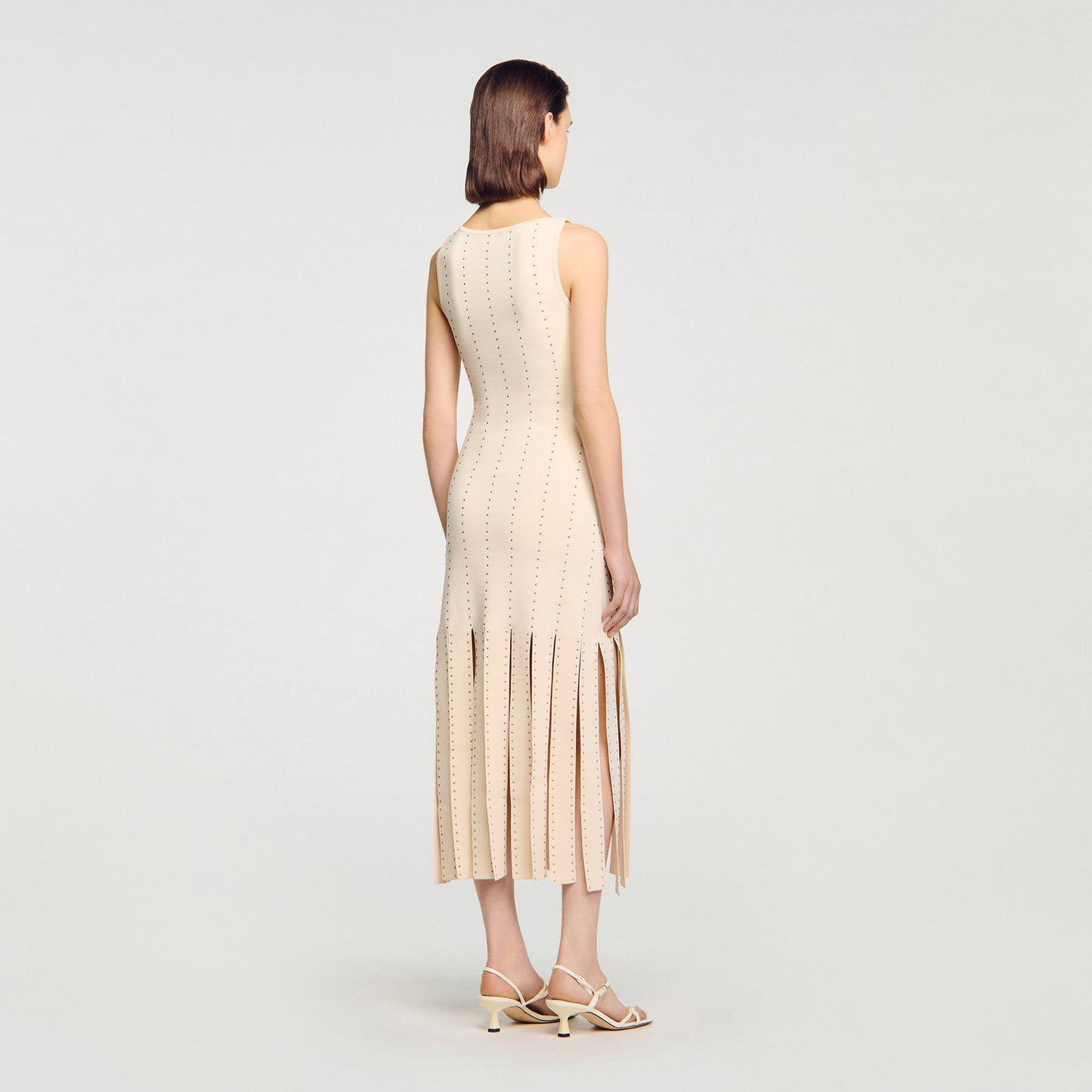 Vestido largo de punto con flecos
