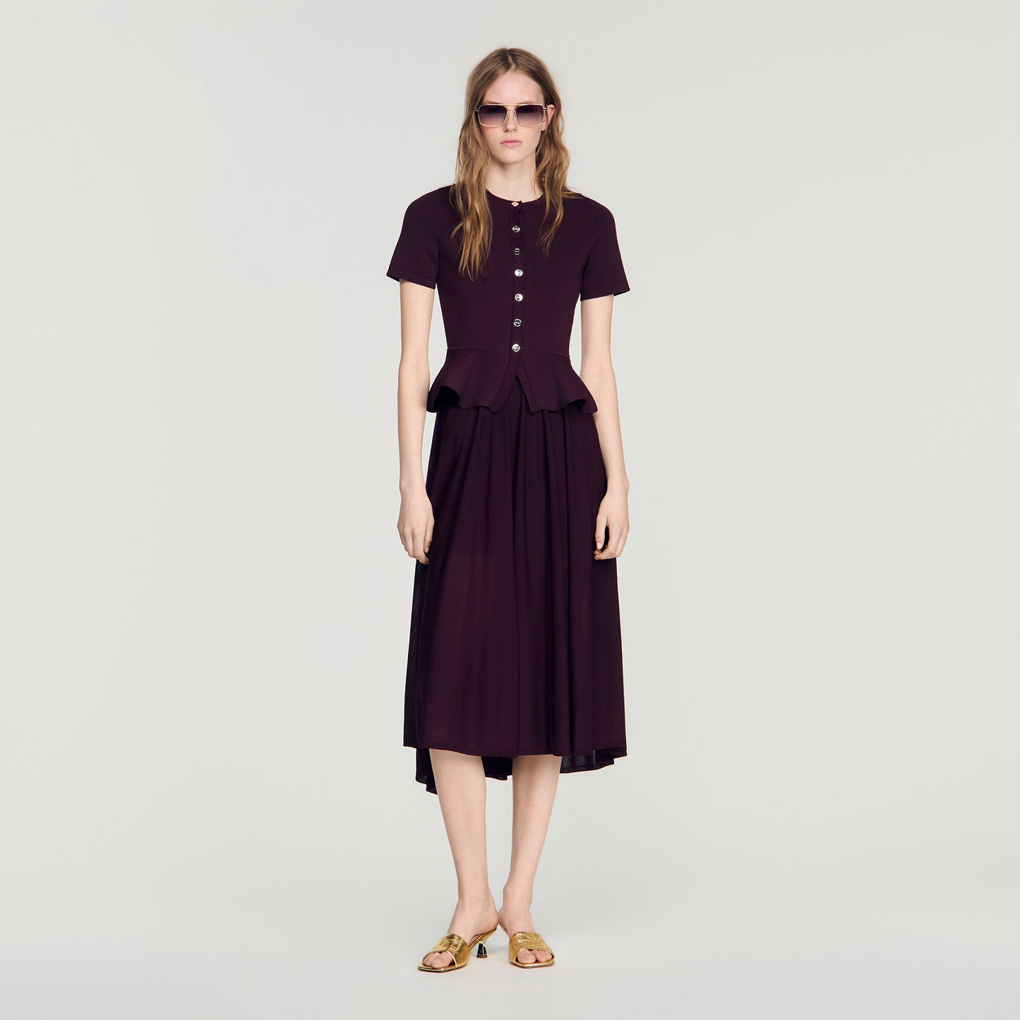 Vestido largo de punto con peplum
