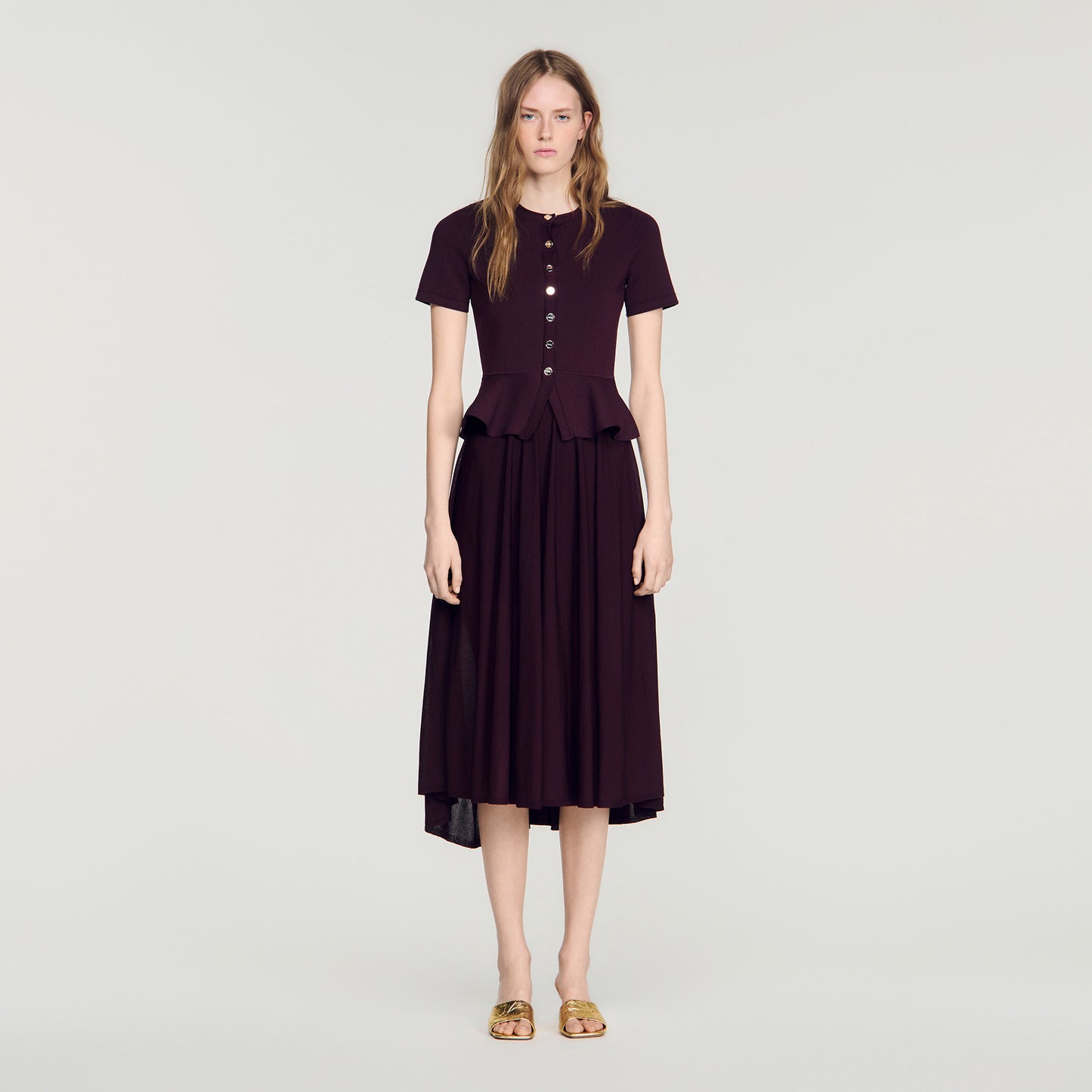 Vestido largo de punto con peplum