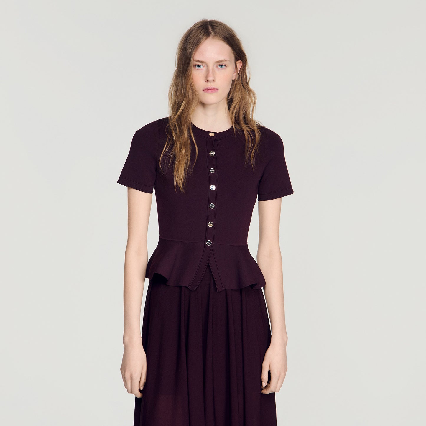 Vestido largo de punto con peplum