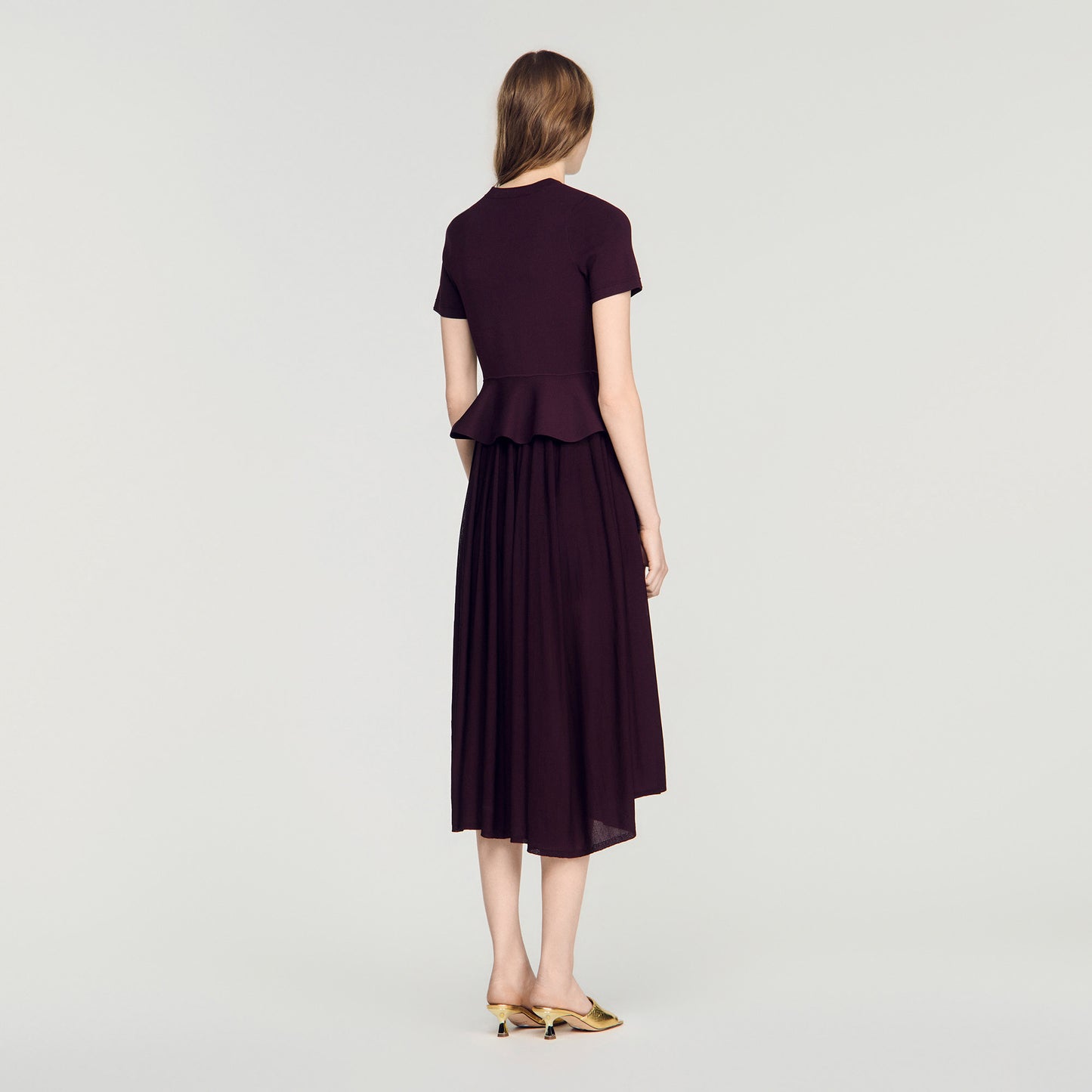 Vestido largo de punto con peplum