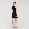 Vestido corto de punto con cadena