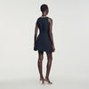Vestido corto con detalle joya