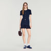 Vestido corto de punto con volantes