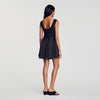 Vestido corto de punto con perlas