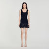 Vestido corto de punto con tachas