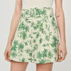 Short ancho con estampado de palmeras