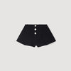 Short acampanado con automáticos